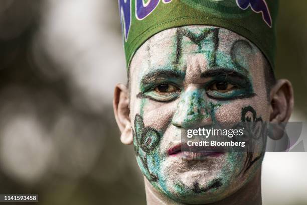 Supporter attends a campaign rally with West Benghal Chief Minister Mamata Banerjee in Swarupnagar, West Bengal, India, on Monday, April 29, 2019....