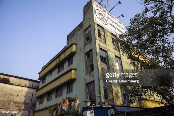 Signage is displayed atop the All India Trinamool Congress party headquarters in Kolkata, West Bengal, India, on Tuesday, April 30, 2019. West Bengal...