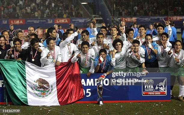 Players of National team of Mexico U 17 celebrate their championship of FIFA World Cup at Nacional Stadium on October 2, 2005 in Lima, Peru.