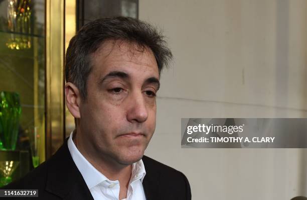 Michael Cohen, the former lawyer for US President Donald Trump, leaves his Park Avenue apartment May 6, 2019 to begin serving a three-year sentence...