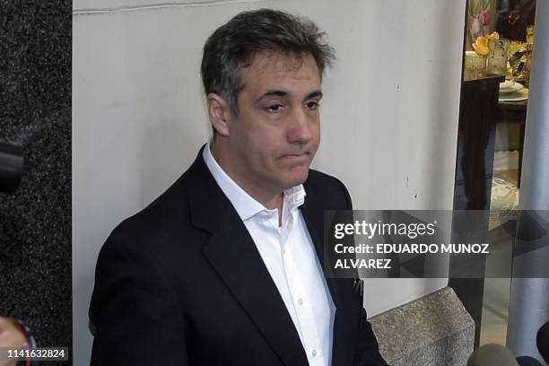 Michael Cohen, the former lawyer for US President Donald Trump, leaves his Park Avenue apartment May 6, 2019 in New York City to begin serving a...