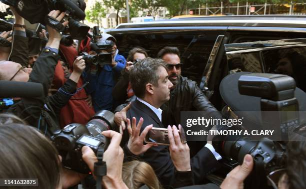 Michael Cohen, the former lawyer for US President Donald Trump, leaves his Park Avenue apartment May 6, 2019 in New York City to begin serving a...