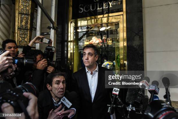 Michael Cohen, former personal lawyer to U.S. President Donald Trump, center, exits his home in New York, U.S., on Monday, May 6, 2019. President...