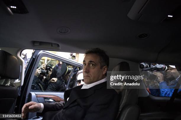 Michael Cohen, the former lawyer for US President Donald Trump, leaves his apartment to begin serving a three-year sentence at a federal prison in...