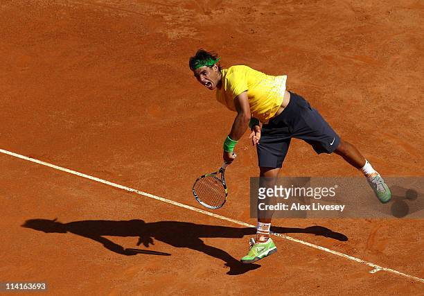 Rafael Nadal of Spain serves during his second round match against Paolo Lorenzi of Italy during day four of the Internazionali BNL d'Italia at the...