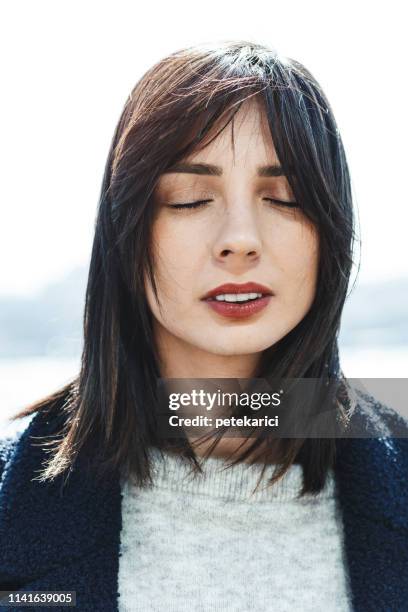 close your eyes - face eyes closed stock pictures, royalty-free photos & images