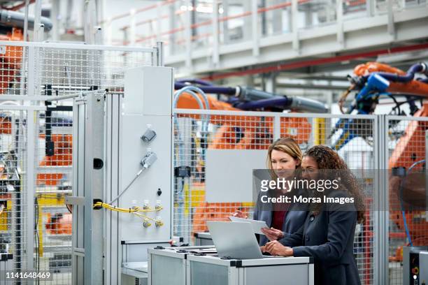 engineers using technologies in auto industry - manufacturing stock pictures, royalty-free photos & images