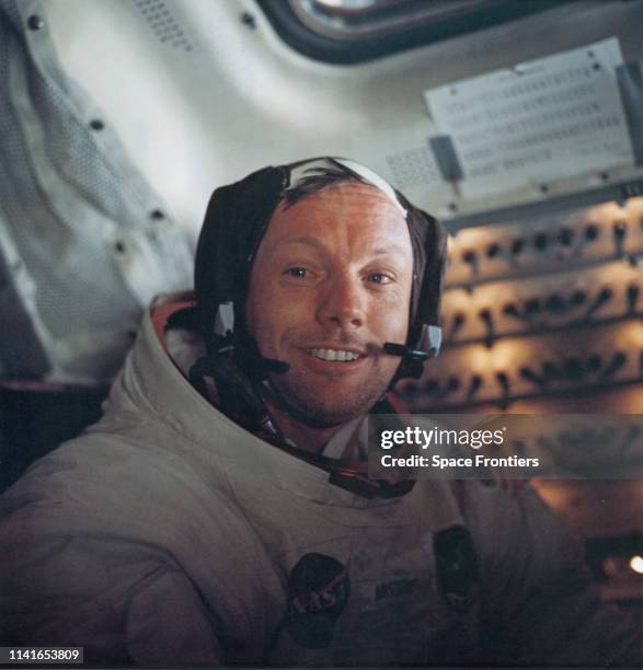 Astronaut Neil Armstrong, Commander of NASA's Apollo 11 lunar landing mission, inside the Lunar Module the 'Eagle' on the surface of the Moon during...