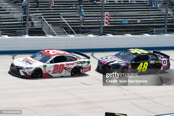 Monster Energy NASCAR Cup Series driver Erik Jones of the Joe Gibbs Racing Toyota Camry and Monster Energy NASCAR Cup Series driver Jimmie Johnson of...