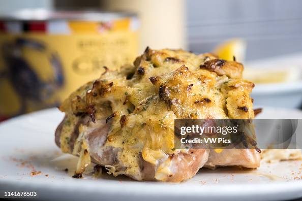 A hearty portion of crab imperial is served atop a fillet of rockfish. A hearty portion of crab imperial is served atop a fillet of rockfish.