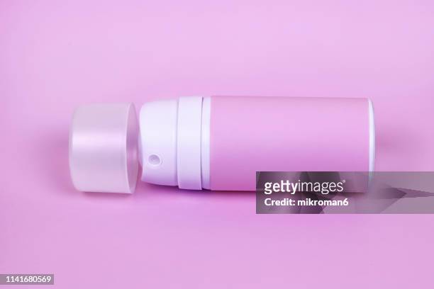 pink aerosol can - deodorant stock pictures, royalty-free photos & images