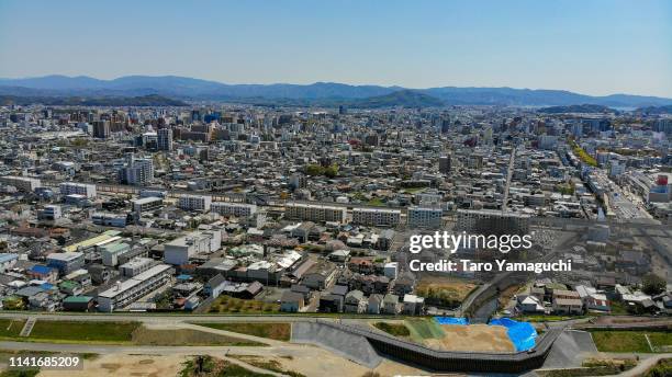 wakayama city and kinokawa river in the daytime - wakayama prefecture stock pictures, royalty-free photos & images