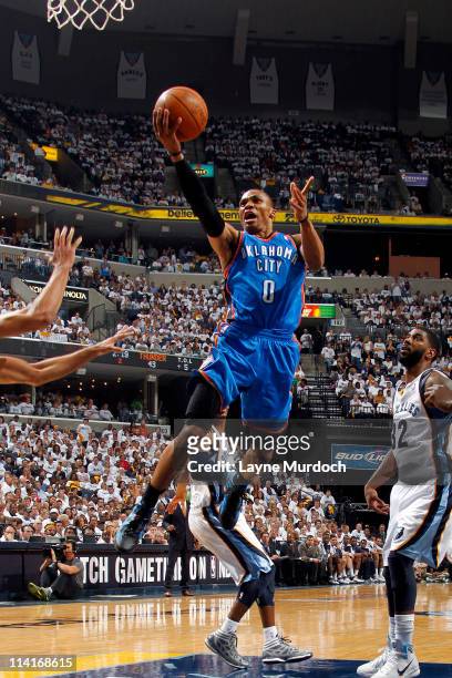 Russell Westbrook of the Oklahoma City Thunder shoots against O.J. Mayo of the Memphis Grizzlies during Game Six of the Western Conference Semifinals...