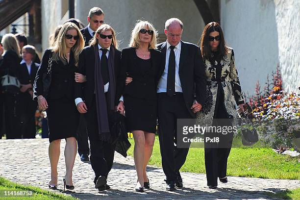 Mirja Larson , wife of Gunter Sachs, sons Halifax Sachs , Christian Sachs and mourners attend Gunter Sachs' funeral service held at Mauritiuskirche...