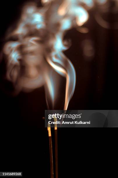 incense stick smoke meditation worship - incense stock pictures, royalty-free photos & images