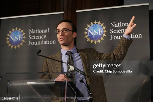 Event Horizon Telescope Director Sheperd Doeleman addresses a news conference to reveal the first photograph of a black hole at the National Press...