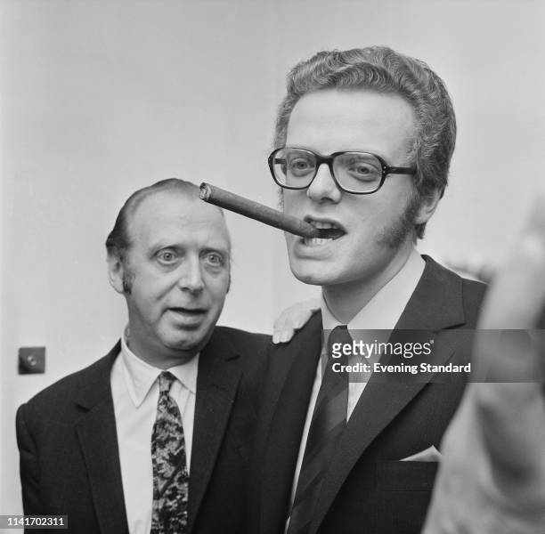 British theatrical talent agent Leslie Grade with his son, English television executive and businessman Michael Grade, UK, 27th October 1969.
