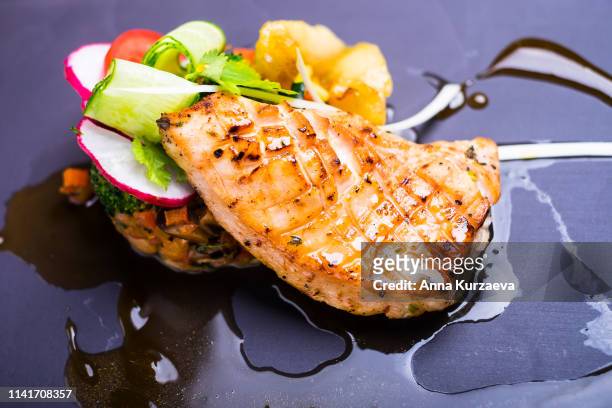 grilled salmon or trout fish fillet served with vegetables, top view - trout stock photos et images de collection