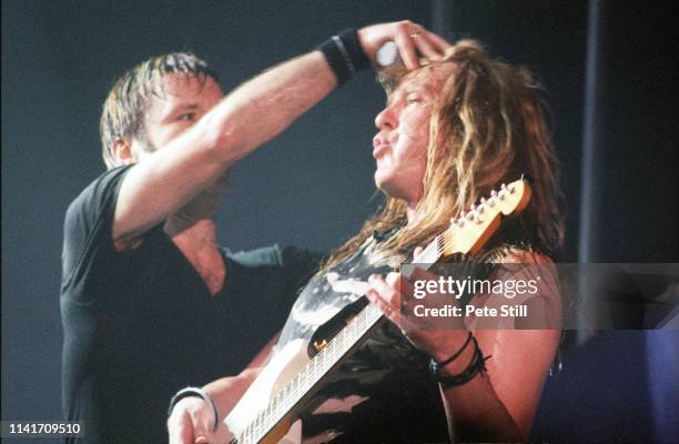 Bruce Dickinson and Janick Gers of Iron Maiden perform on stage at Earls Court Arena on June 16th, 2000 in London, England.