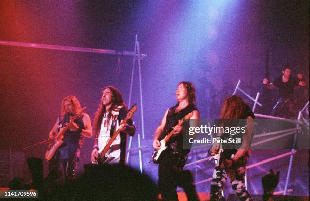 Adrian Smith, Steve Harris, Dave Murray, Janick Gers and Bruce Dickinson of Iron Maiden perform on stage at Earls Court Arena on June 16th, 2000 in...