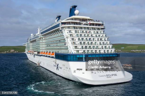 Celebrity Eclipse Valletta, Solstice-class cruise ship operated by Celebrity Cruises departing Lerwick harbour, Shetland Islands, Scotland, UK.