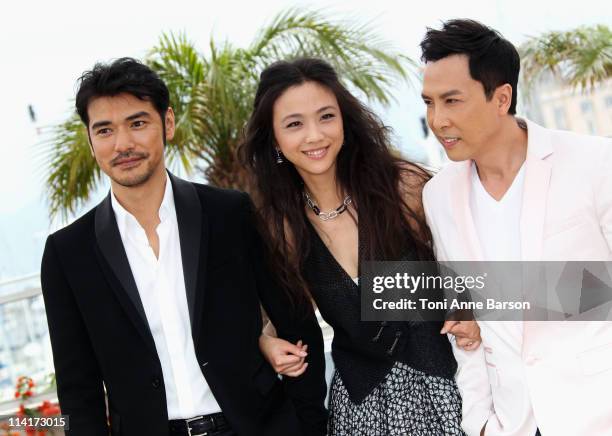 Actors Takeshi Kaneshiro, Tang Wei and Donnie Yen attends the "Wu Xia" Photocall during the 64th Annual Cannes Film Festival at Palais des Festivals...