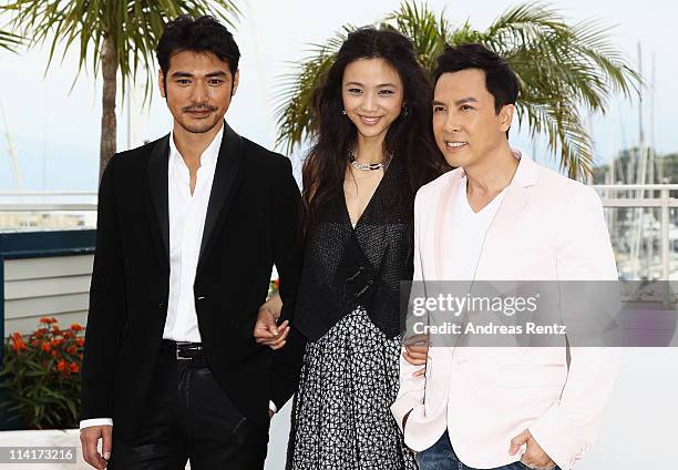 Takeshi Kaneshiro, Tang Wei, and Donnie Yen attends the "Wu Xia" Photocall at the Palais des Festivals during the 64th Cannes Film Festival on May...