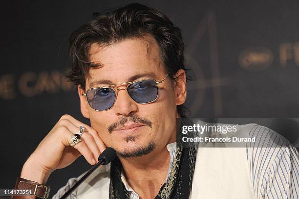 Actor Johnny Depp attends the "Pirates of the Caribbean: On Stranger Tides" press conference at the Palais des Festivals during the 64th Cannes Film...