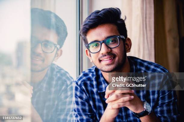 portrait of a confident young man - boys stock pictures, royalty-free photos & images