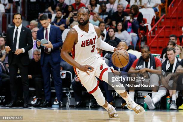 Dwyane Wade of the Miami Heat in action against the Philadelphia 76ers during the second half at American Airlines Arena on April 09, 2019 in Miami,...