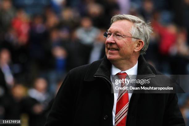 Manchester United Manager Sir Alex Ferguson smiles after drawing the Barclays Premier League match between Blackburn Rovers and Manchester United but...