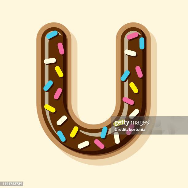 glazed chocolate donut letter - chocolate icing stock illustrations