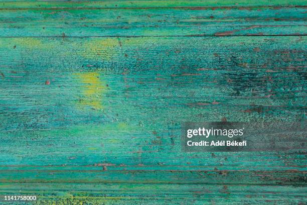 green wood background - blue wooden table stock-fotos und bilder