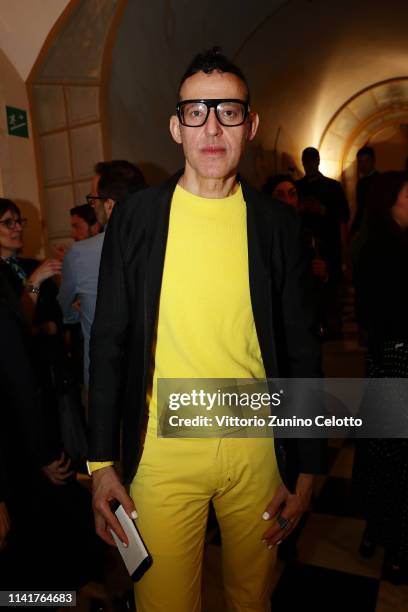 Karim Rashid attends Prada Invites Cocktail Event on April 10, 2019 in Milan, Italy.