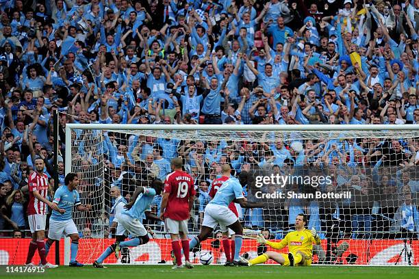 Yaya Toure of Manchester City celebrates after scoring the opening goal during the FA Cup sponsored by E.ON Final match between Manchester City and...