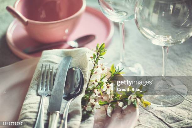 prepare easter meals with colorful dishes and easter eggs - easter dinner stock pictures, royalty-free photos & images