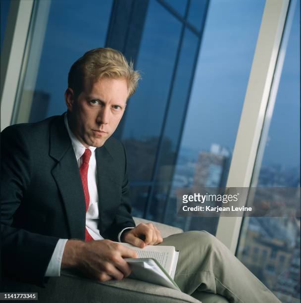 Technology analyst Henry Blodget poses for a portrait at the offices of Merrill Lynch at the World Financial Center on September 11, 2000 in New York...