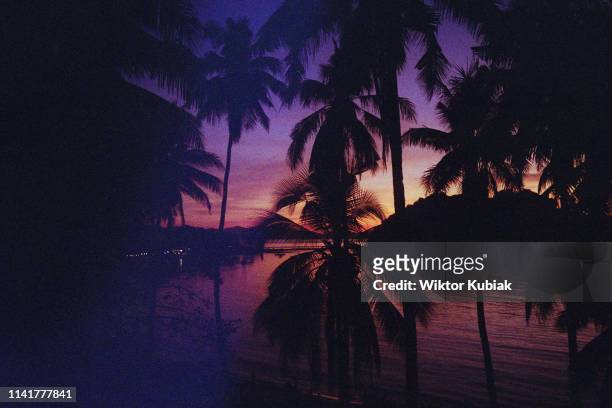 sunset on the palawan island - philippines beach stock pictures, royalty-free photos & images