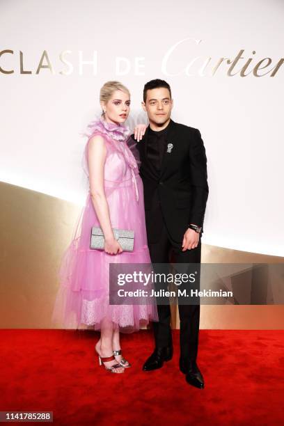 Rami Malek and Lucy Boynton attend the "Clash De Cartier" Launch Photocall At La Conciergerie In Paris on April 10, 2019 in Paris, France.