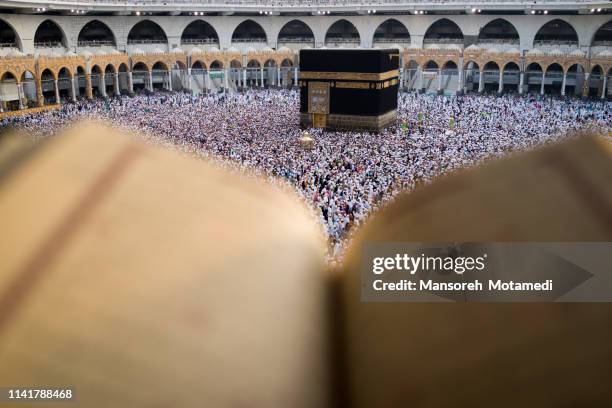 pilgrims in al-haram mosque - pilgrim stock pictures, royalty-free photos & images