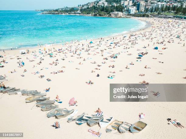 aerial view of coogee beach with abandoned boats on the sand - coogee beach stock pictures, royalty-free photos & images