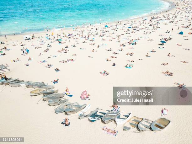 aerial view of coogee beach with abandoned boats on the sand - playa coogee fotografías e imágenes de stock