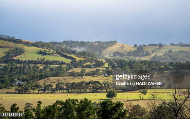 clouds over rolling hills | regional victoria | australia - victoria aerial stock pictures, royalty-free photos & images