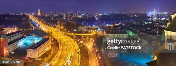 slasko-dabrowski bridge and mariensztat in warsaw at night - warsaw panorama stock pictures, royalty-free photos & images