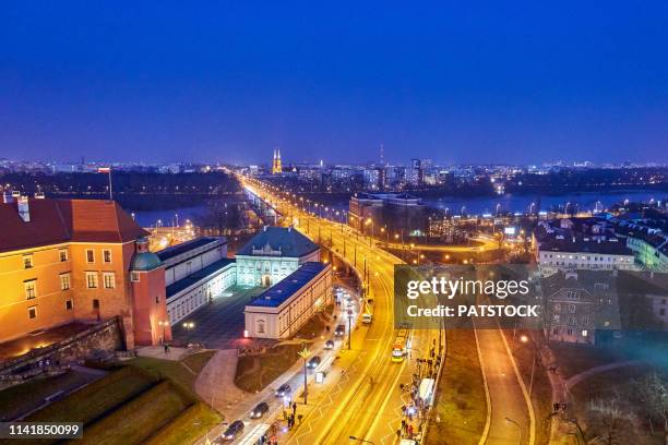 night traffic on slasko-dabrowski bridge in warsaw - warsaw panorama stock pictures, royalty-free photos & images