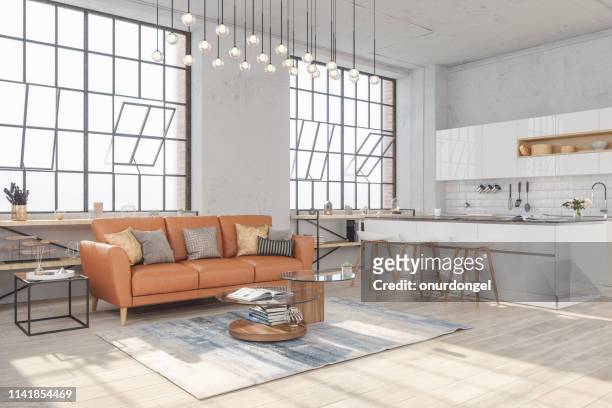 moderno soggiorno interno con pavimenti in legno e vista sulla cucina in nuova casa di lusso - loft interior foto e immagini stock
