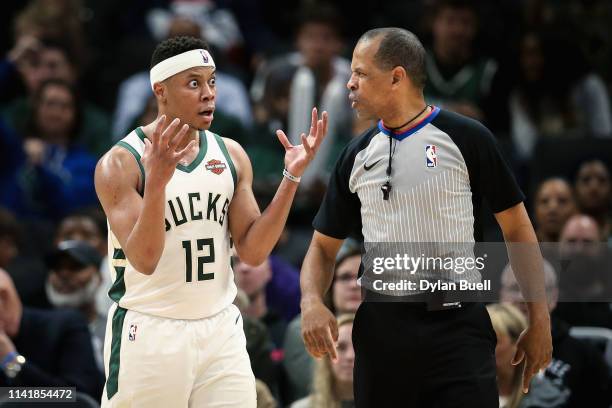 Tim Frazier of the Milwaukee Bucks reacts to a call by referee Eric Lewis in the fourth quarter against the Oklahoma City Thunder at the Fiserv Forum...