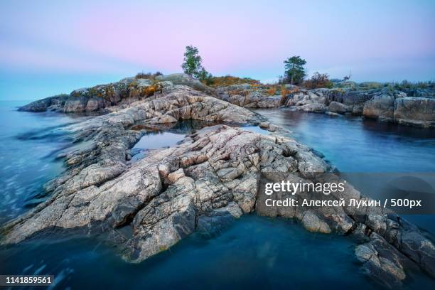 mysterious stone beach - lake ladoga stock pictures, royalty-free photos & images