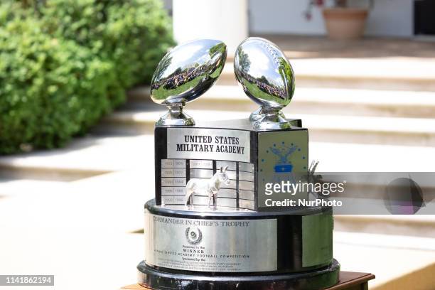 The Commander-in-Chief's Trophy sits on a table before President Trump's presentation to the U.S. Military Academy football team, the Army Black...