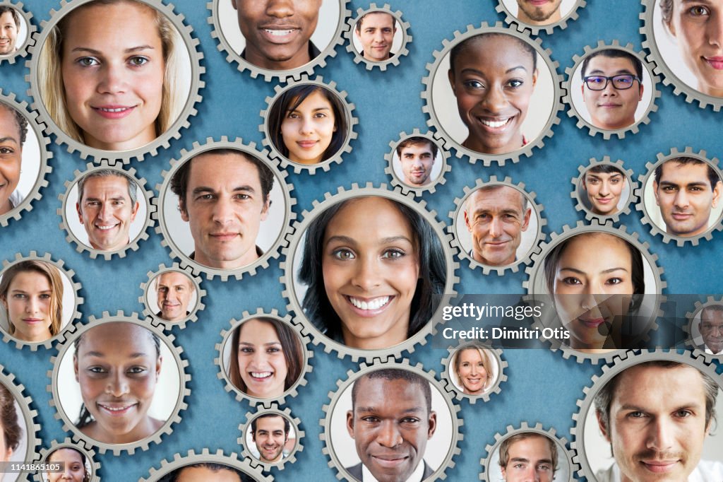 Teamwork Faces On Interlinked Cogs High-Res Stock Photo - Getty Images